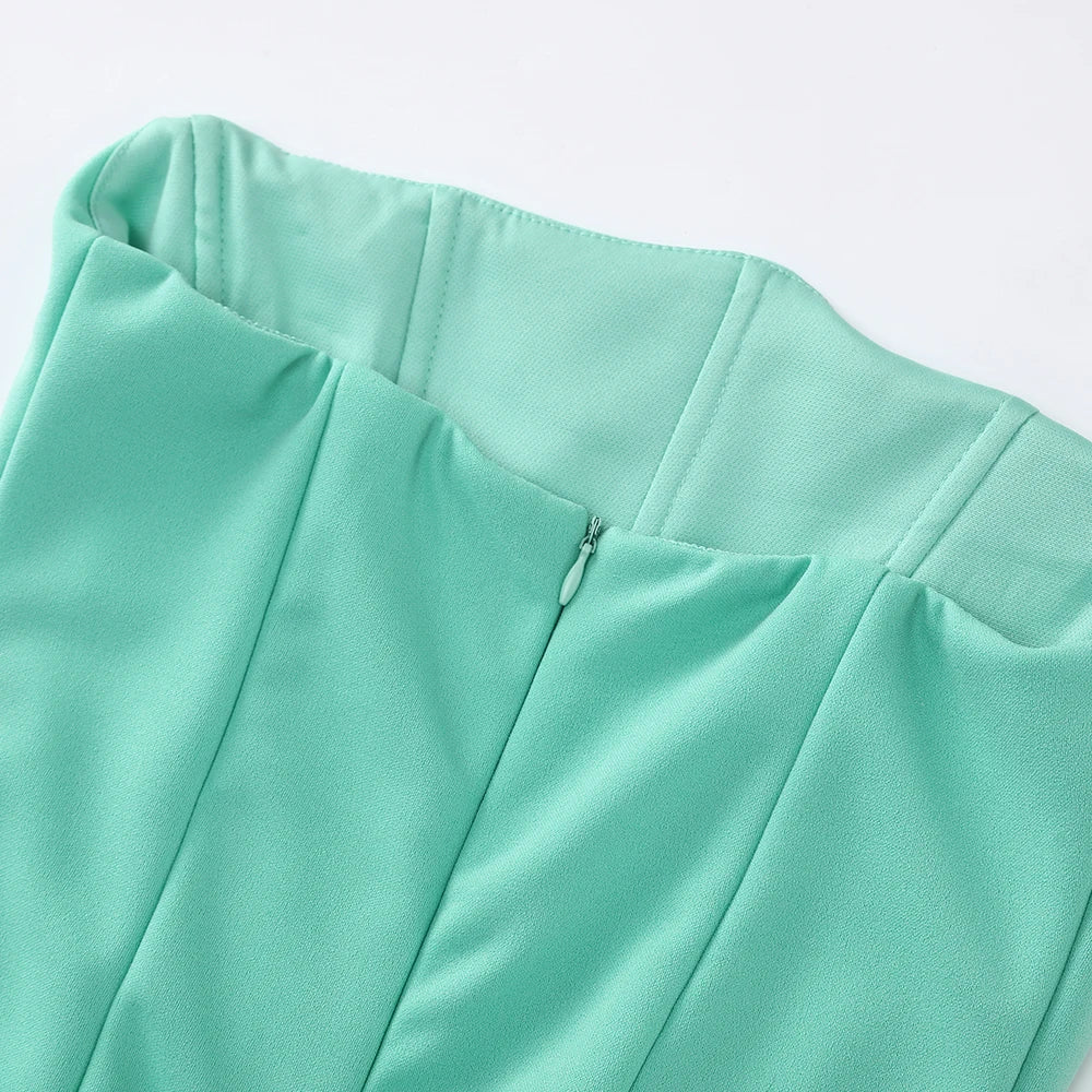 Close-up of a light green garment on a white background