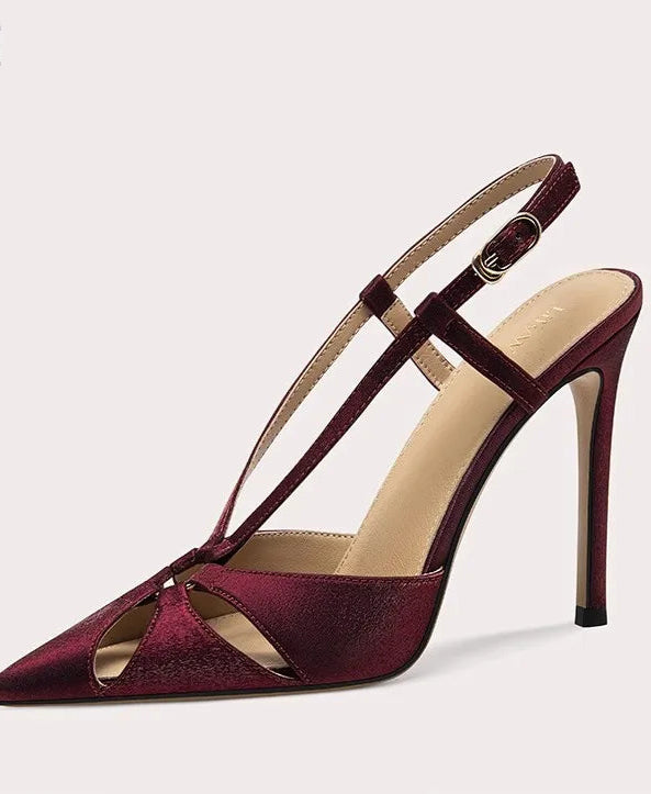 Maroon high-heeled sandal on a light gray background