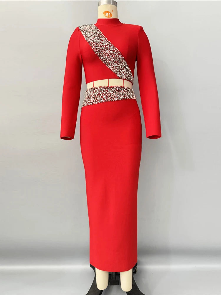 Red dress with embellished top on a mannequin against a gray background