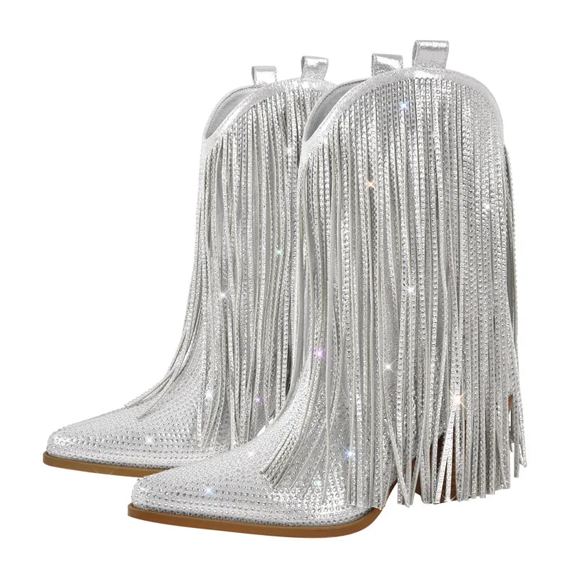 Silver fringe boots with rhinestone embellishments on a white background