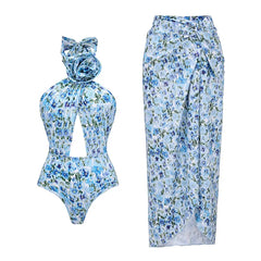 Floral print one-piece swimsuit with a cutout and matching wrap skirt