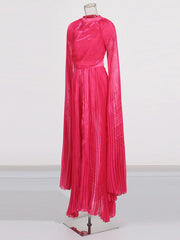 Pink pleated dress on a mannequin against a white background