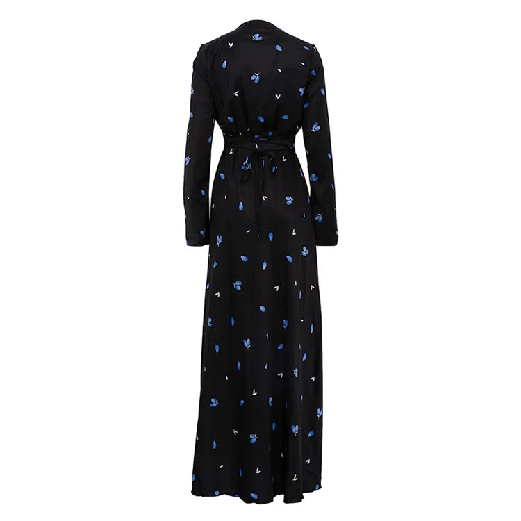 Black dress with blue floral pattern on a white background