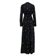 Black dress with blue floral pattern on a white background