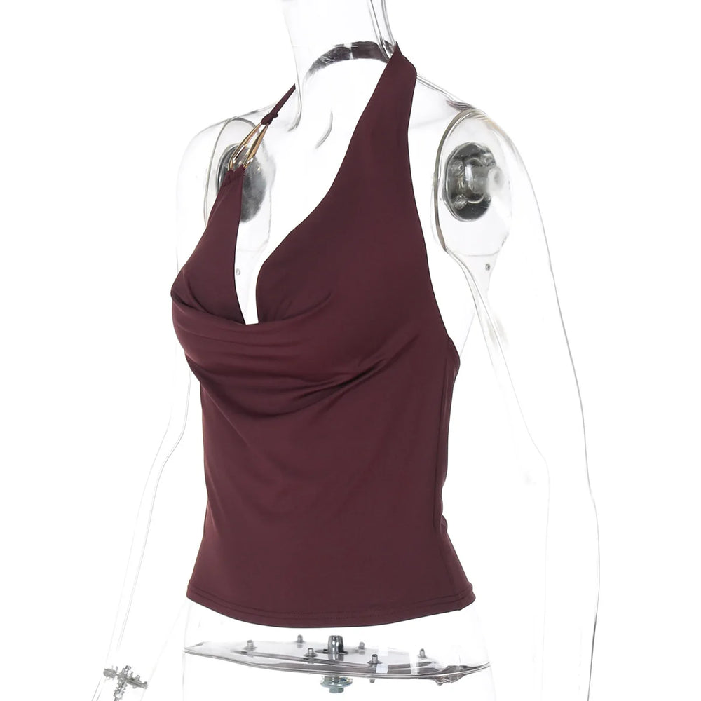 Red wine halter top on a clear mannequin against a white background