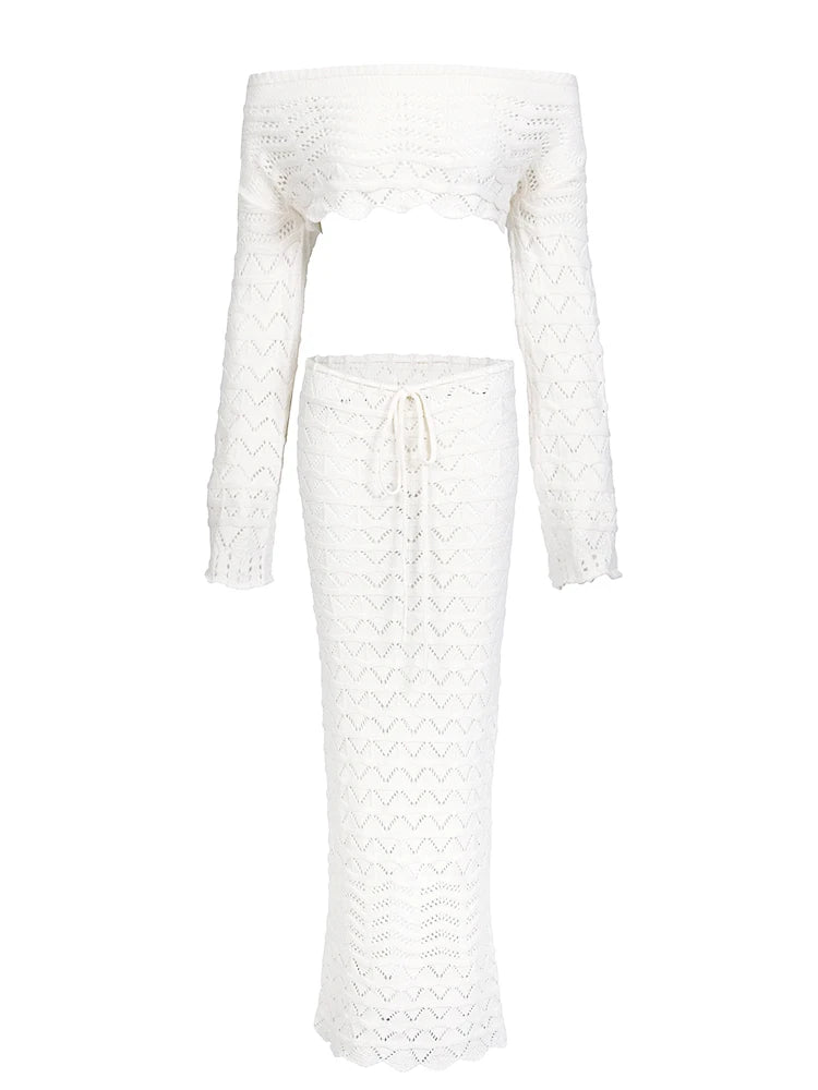 White lace top and skirt set on a white background