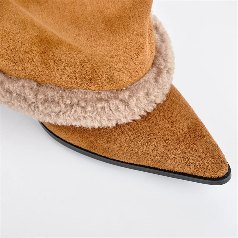 Close-up of the pointed toe and plush trim on the boots