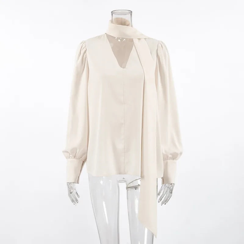 White blouse on a mannequin against a white background