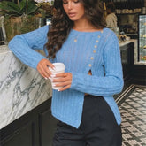 Blue knit top with asymmetric hem and side button detail