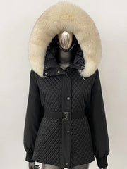 Black quilted jacket with a large fur hood on a mannequin against a white background