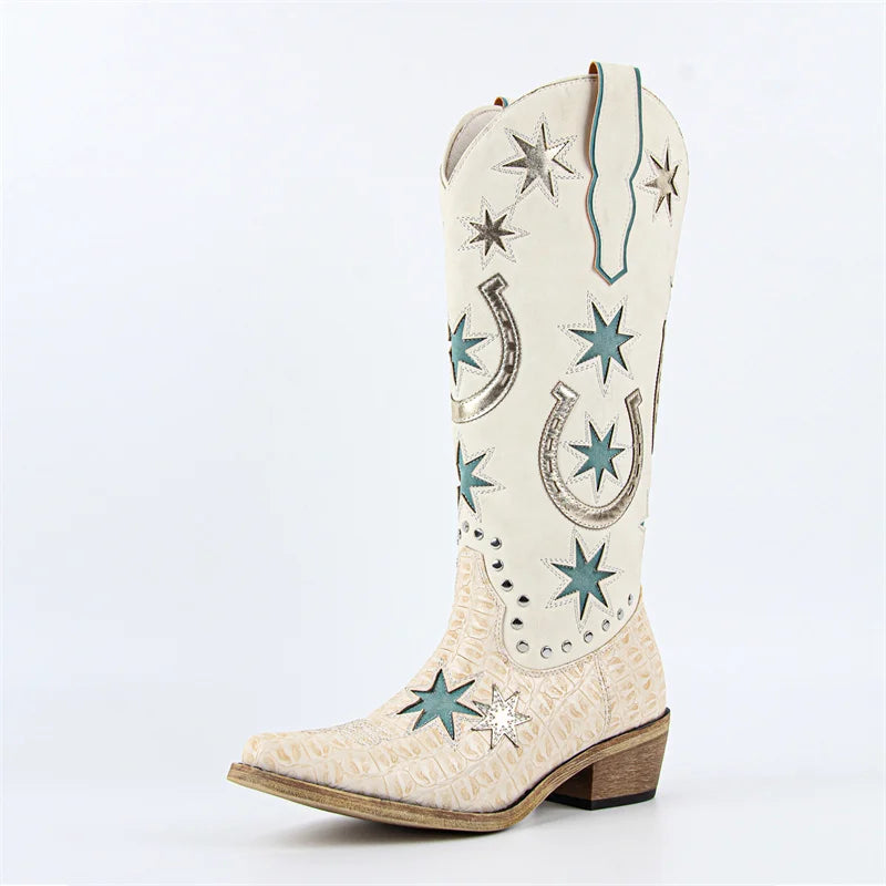 White cowboy boot with star and horseshoe patterns on a light gray background