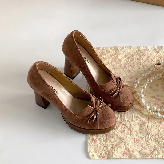 Brown butterfly-knot round toe platform heels