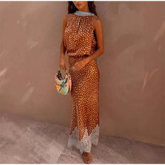 Model wearing the polka dot print halter top and lace trim maxi skirt set