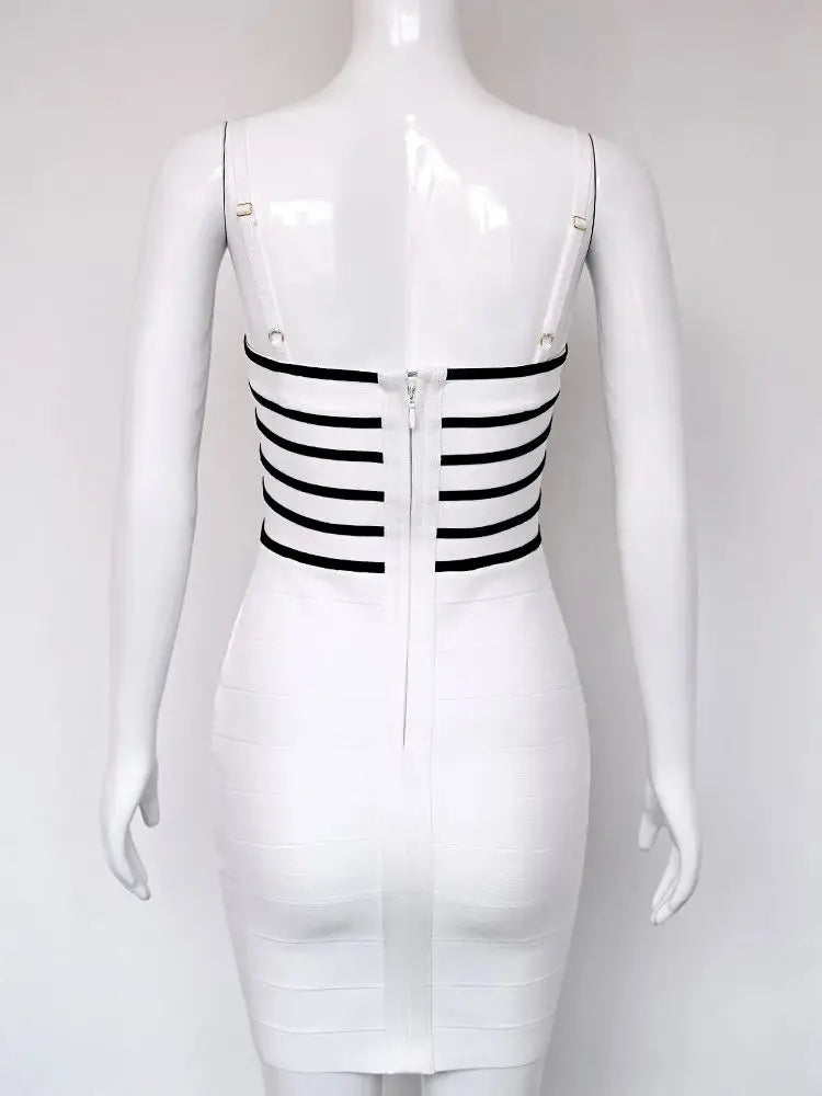 White dress with black stripes on a mannequin against a white background