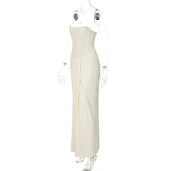 White strapless gown on a mannequin against a white background