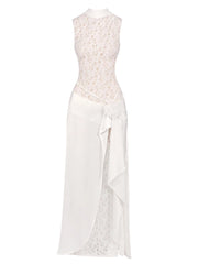 White lace dress with a sheer overlay on a white background