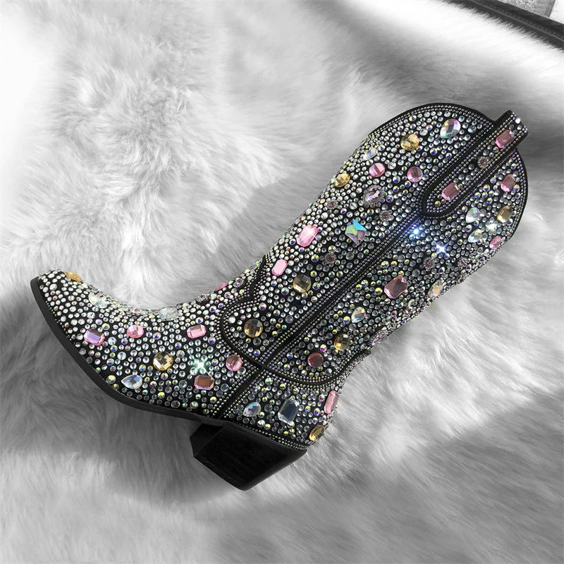 Decorative boot with colorful gemstones on a fluffy white surface