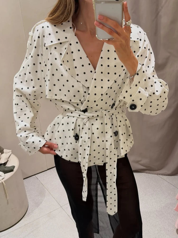 Polka dot belted trench coat front view