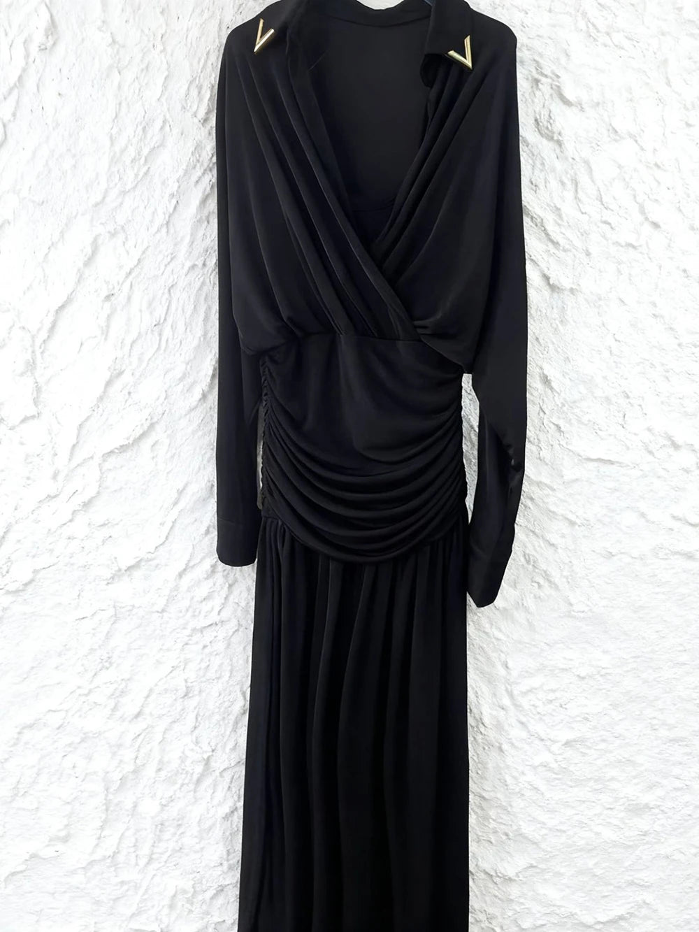 Black maxi dress laid flat