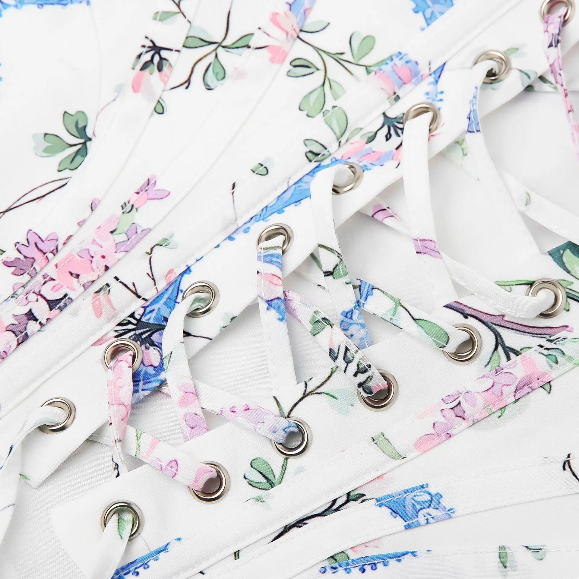 Floral-patterned shoelaces on a white background