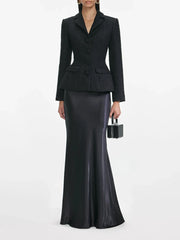 Black tweed short blazer paired with a satin mermaid skirt