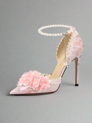 Pink high-heeled shoe with floral design and chain detail on a white background, branded 'LILY WEI'.