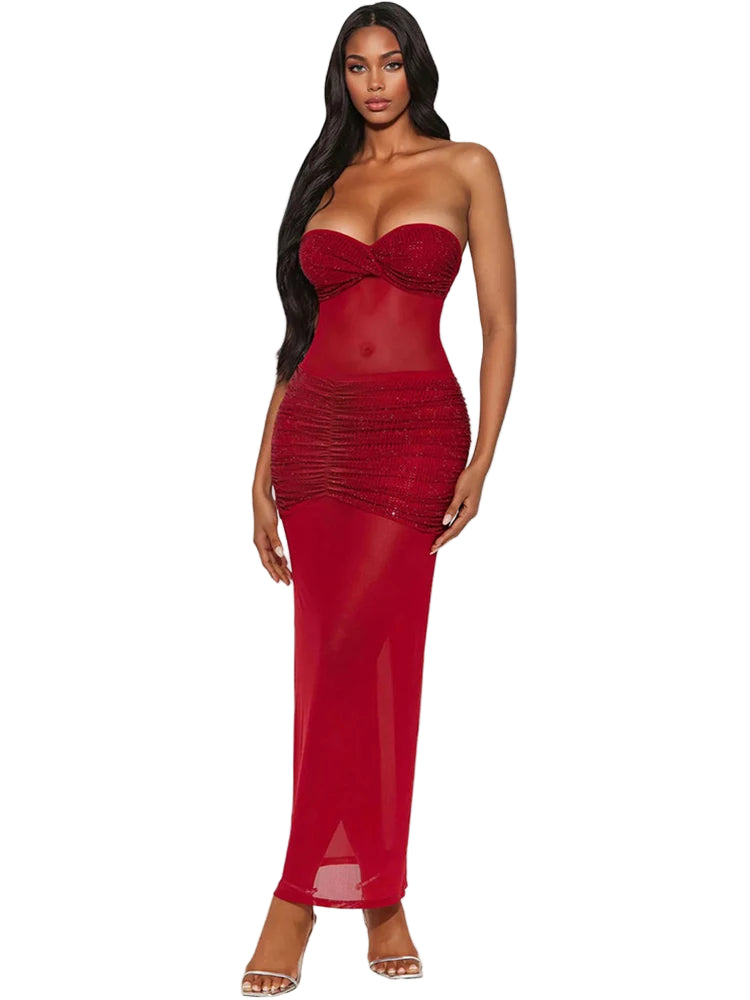 Woman wearing a red strapless dress with sheer overlay
