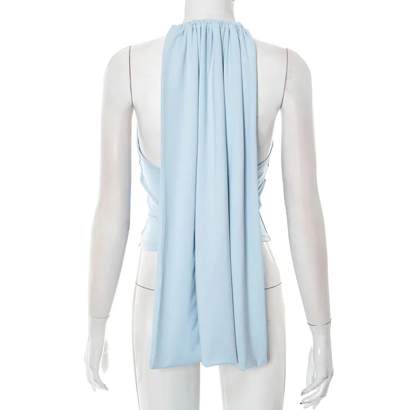 Mannequin wearing a light blue scarf draped over one shoulder on a white background