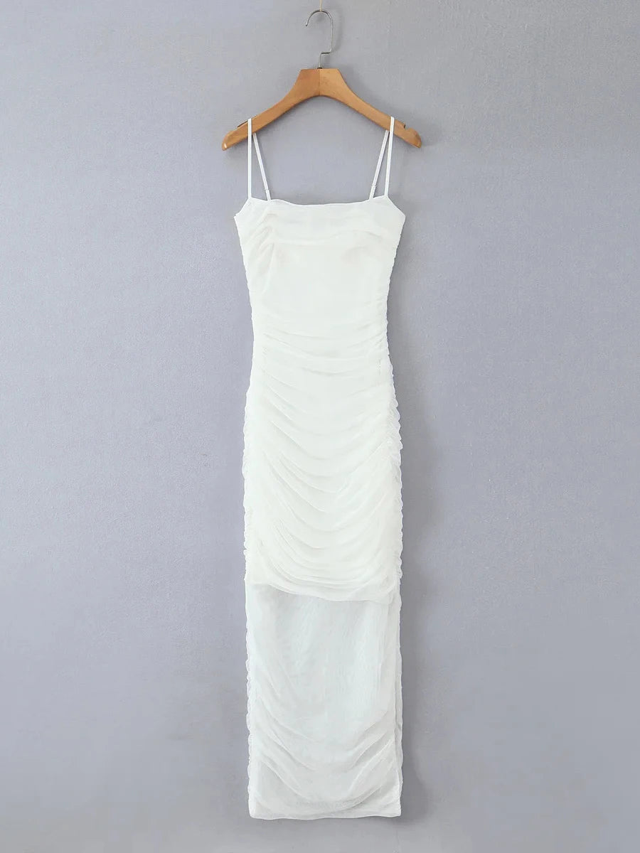 White dress on a hanger against a gray background