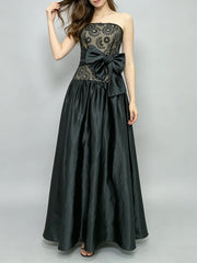 Strapless lace bodice full skirt gown with bow accent