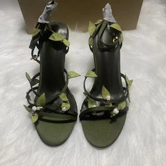 Leaf embellished stiletto heels with buckle strap