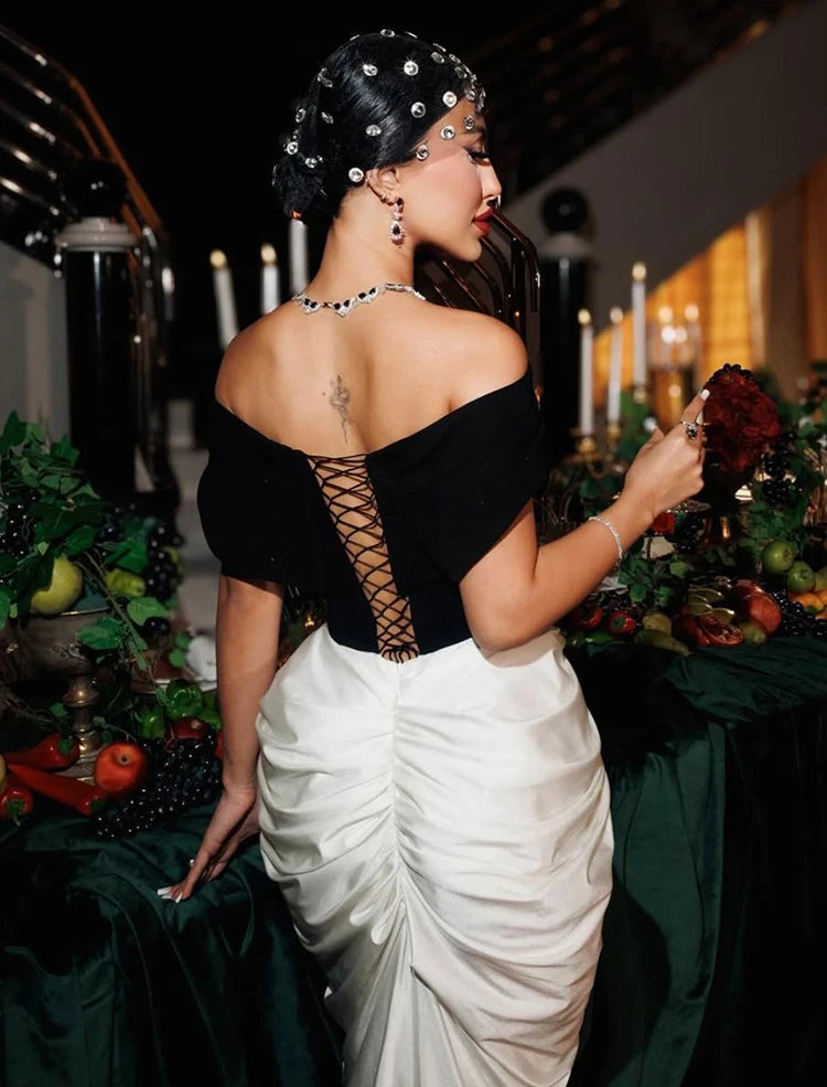 Elegant sheath gown with lace back and patchwork design