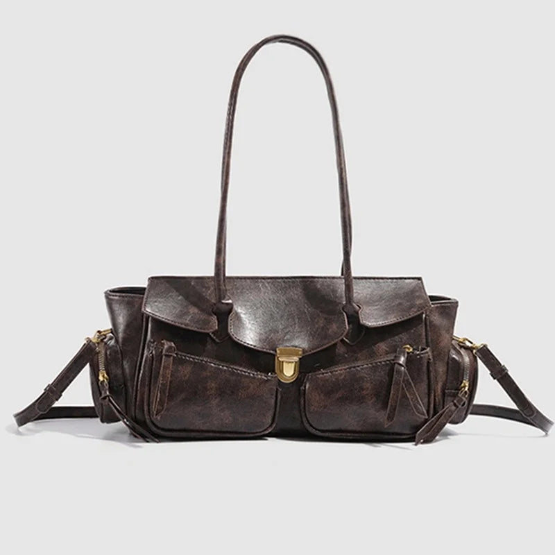 black soft leather baguette shoulder bag with pockets