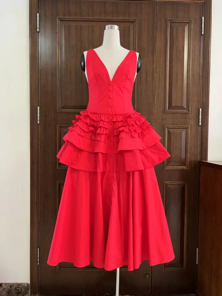 Red dress on a mannequin against a wooden door background