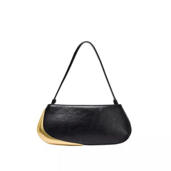 Black handbag with gold accent on a white background