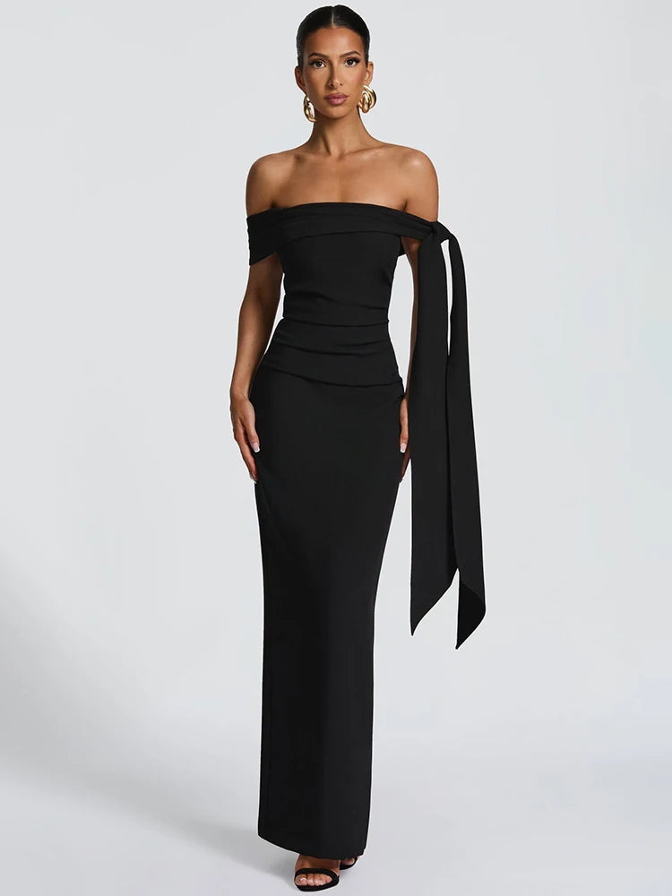 Black off-shoulder gown with a long train
