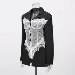 Black jacket with white lace detailing on a mannequin against a white background