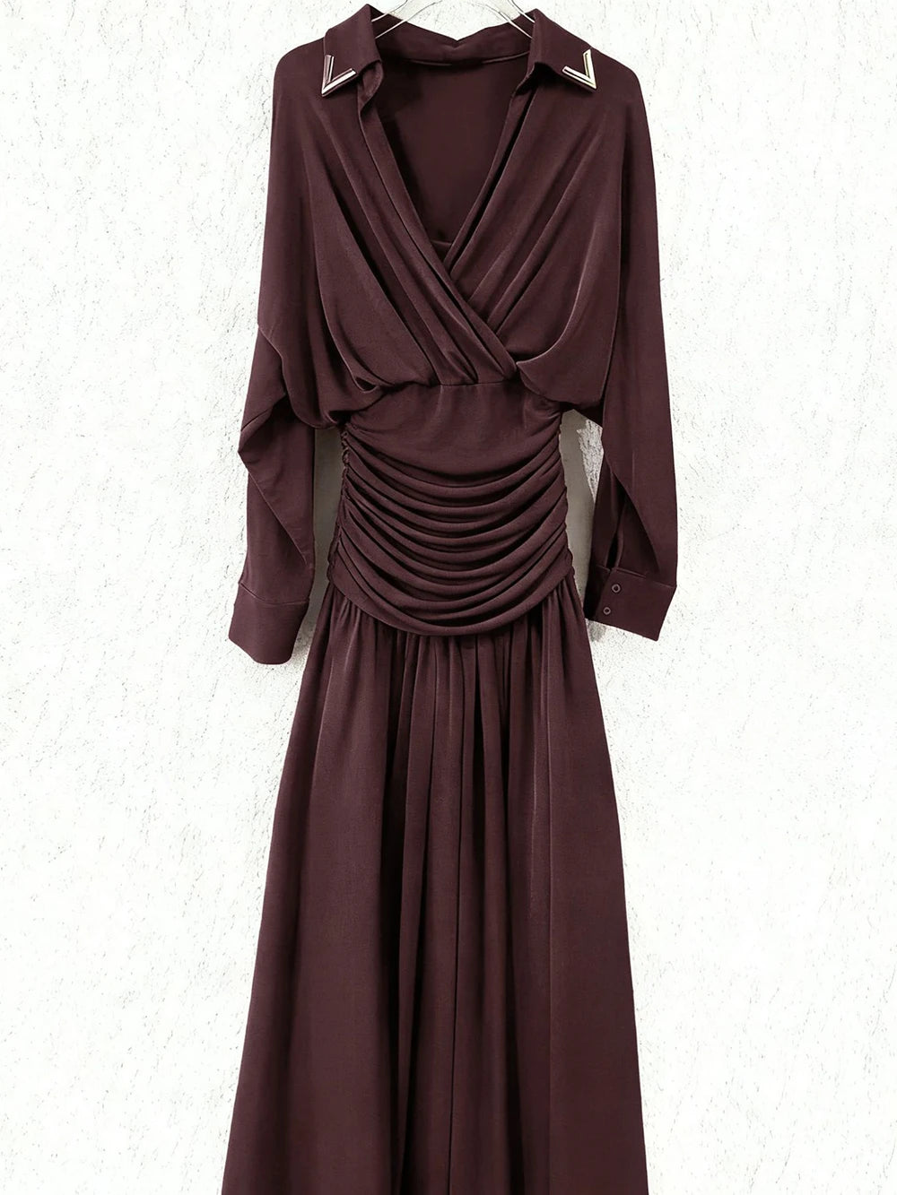 Brown maxi dress laid flat