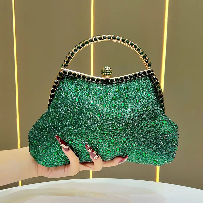 Green crystal-encrusted top handle clutch bag
