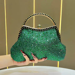 Green crystal-encrusted top handle clutch bag