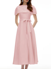 Pink midi dress with embellished cape and sash belt