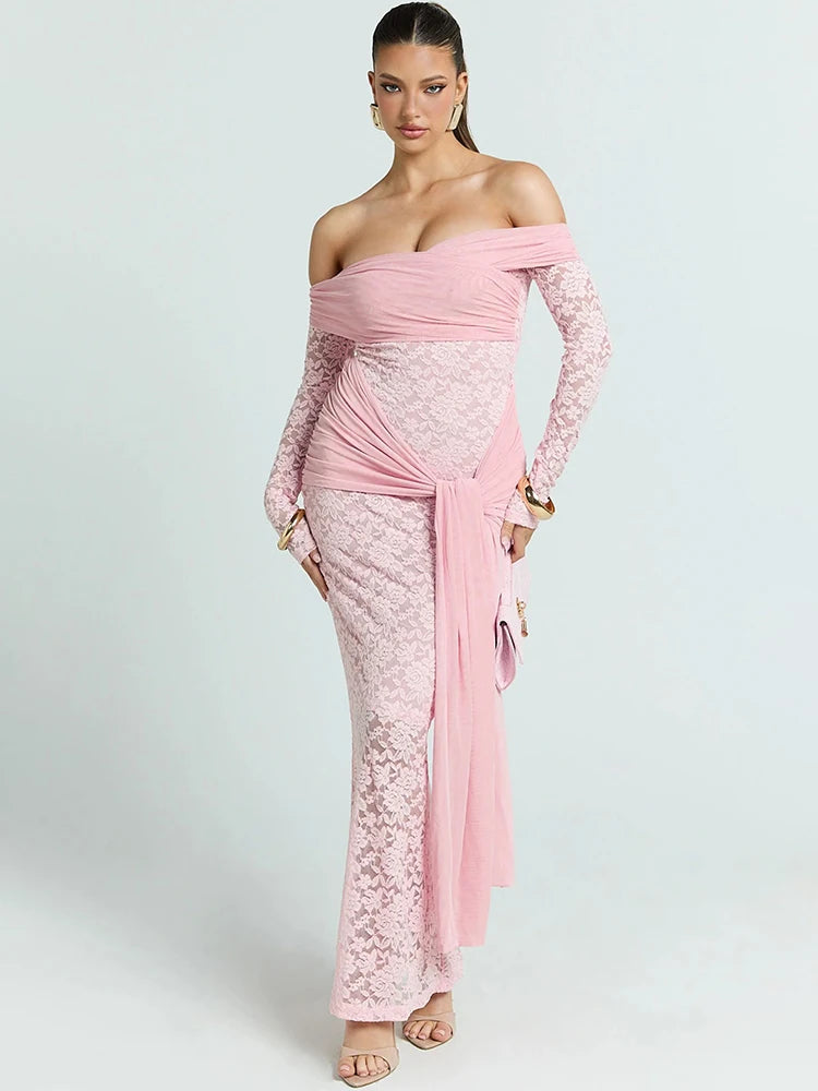 Woman wearing a pink lace off-shoulder dress