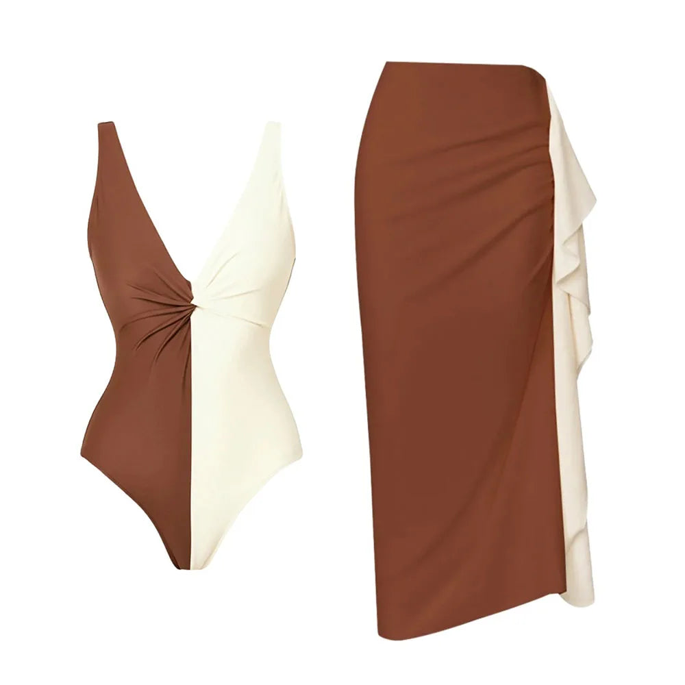 A two-tone brown and white one-piece swimsuit and a matching ruffled skirt.