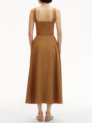 Brown dress worn by a model on a white background