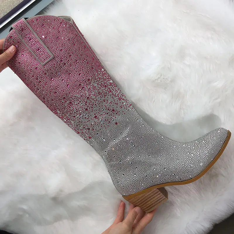 Pink and silver glittery boot on a white fur surface