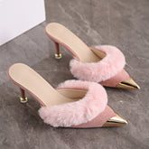 Pink faux fur trim pointed heel mules with metallic toe cap.