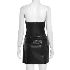 Black leather dress on a mannequin against a white background