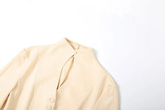 Beige blazer on a white background