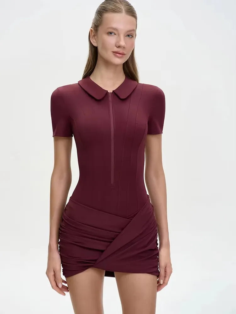 Burgundy collared zipper romper with ruched skirt