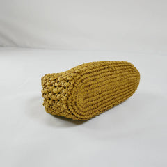 Mustard yellow woven cylindrical pillow on a white background